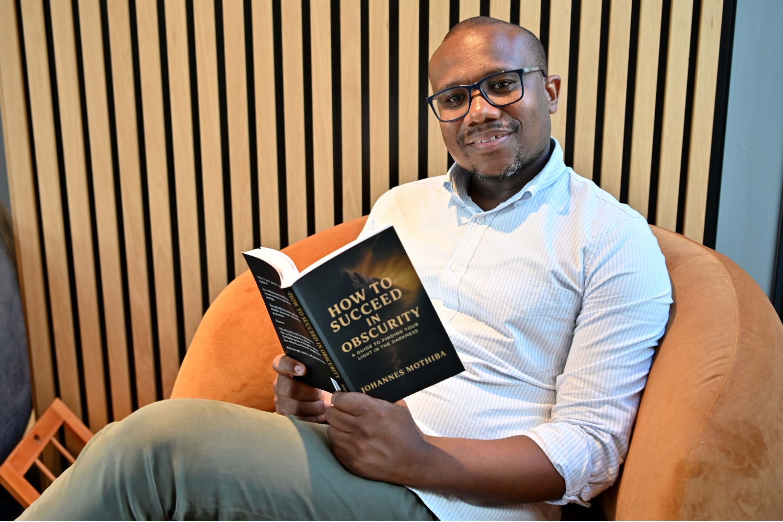 Johannes Mothiba reading How To Succeed in Obscurity