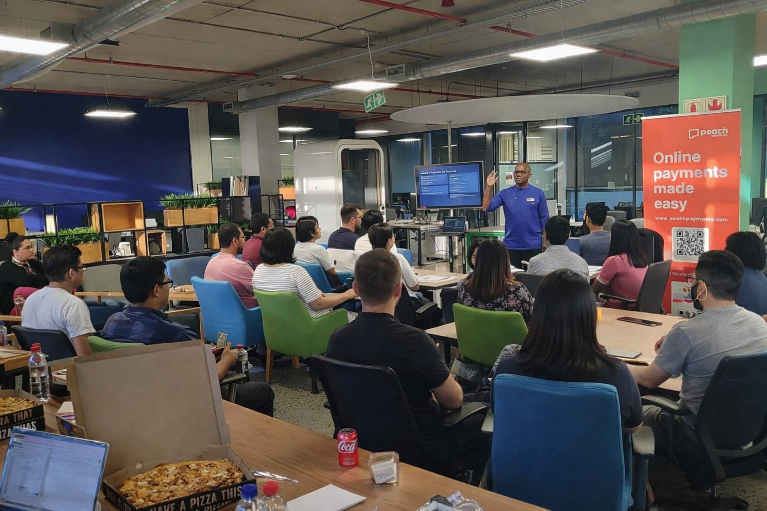 Johannes speaking at an event